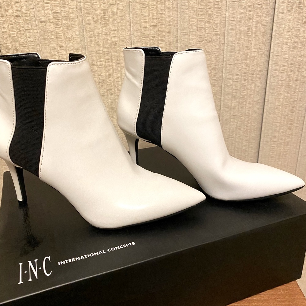 SOLD White for winter ankle low heeled boot. Never worn. Size 6M.